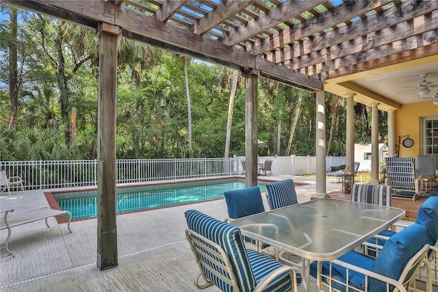 8608 Poinsettia Dr, Temple Terrace, FL 33637 - view of swimming pool with ceiling fan, a patio, and a pergola