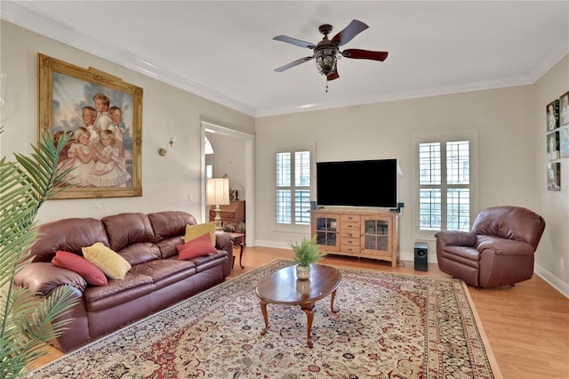 8608 Poinsettia Dr, Temple Terrace, FL 33637 - living room with hardwood / wood-style floors, ceiling fan, and crown molding
