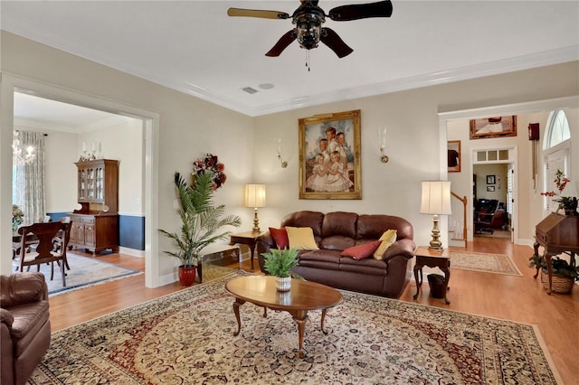 8608 Poinsettia Dr, Temple Terrace, FL 33637 - living room featuring hardwood / wood-style flooring, ornamental molding, and ceiling fan