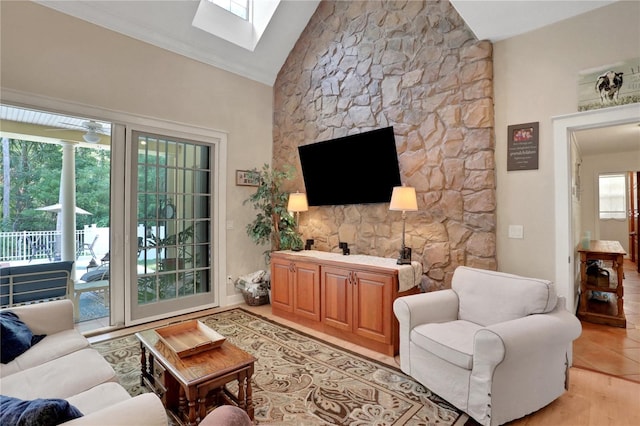 8608 Poinsettia Dr, Temple Terrace, FL 33637 - living room featuring a fireplace and lofted ceiling with skylight