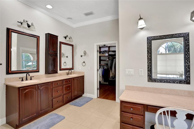 8608 Poinsettia Dr, Temple Terrace, FL 33637 - bathroom with ornamental molding, plenty of natural light, tile flooring, and large vanity