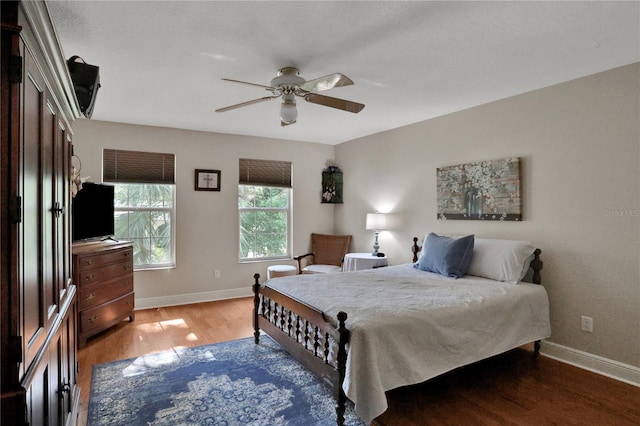 8608 Poinsettia Dr, Temple Terrace, FL 33637 - bedroom featuring ceiling fan and hardwood / wood-style flooring
