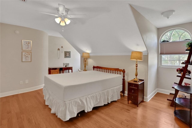 8608 Poinsettia Dr, Temple Terrace, FL 33637 - bedroom featuring lofted ceiling, light hardwood / wood-style flooring, and ceiling fan