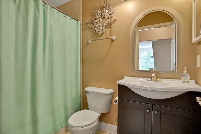8608 Poinsettia Dr, Temple Terrace, FL 33637 - bathroom featuring vanity with extensive cabinet space and toilet