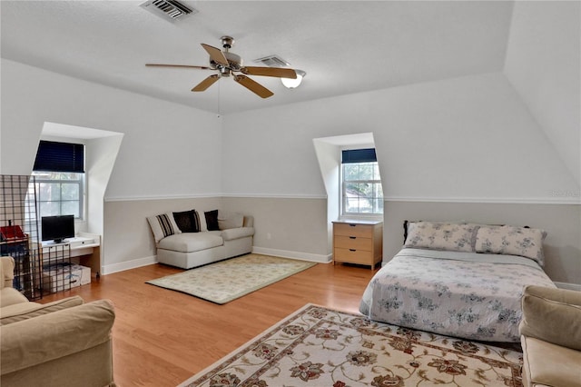 8608 Poinsettia Dr, Temple Terrace, FL 33637 - bedroom with hardwood / wood-style floors and ceiling fan