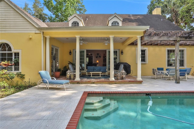 8608 Poinsettia Dr, Temple Terrace, FL 33637 - rear view of house with a pergola, ceiling fan, and a patio area