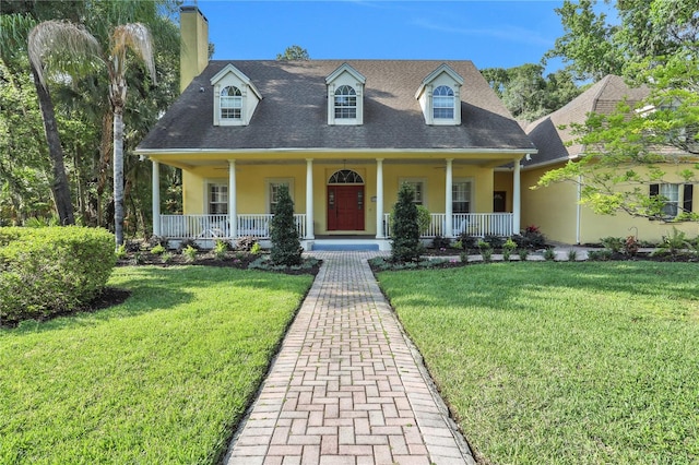8608 Poinsettia Dr, Temple Terrace, FL 33637 - view of front of home featuring a front lawn and a porch