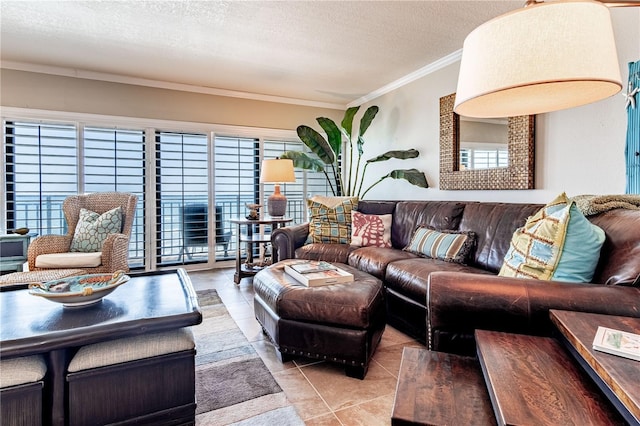 living room with light tile patterned floors, a textured ceiling, and crown molding