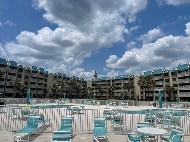 view of pool featuring a patio area