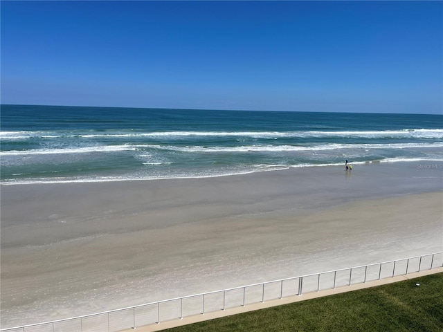 property view of water featuring a beach view