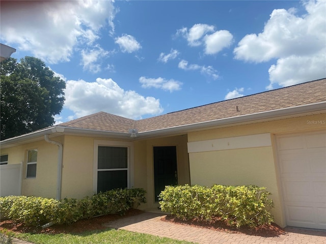 single story home with a garage