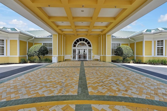 entrance to property featuring french doors