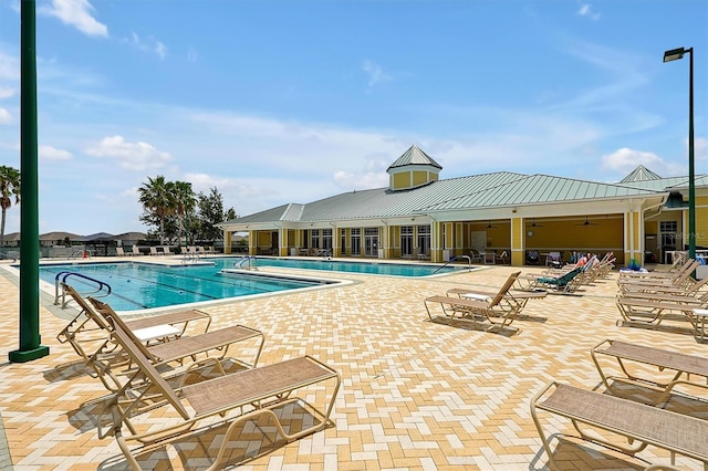 view of swimming pool featuring a patio area