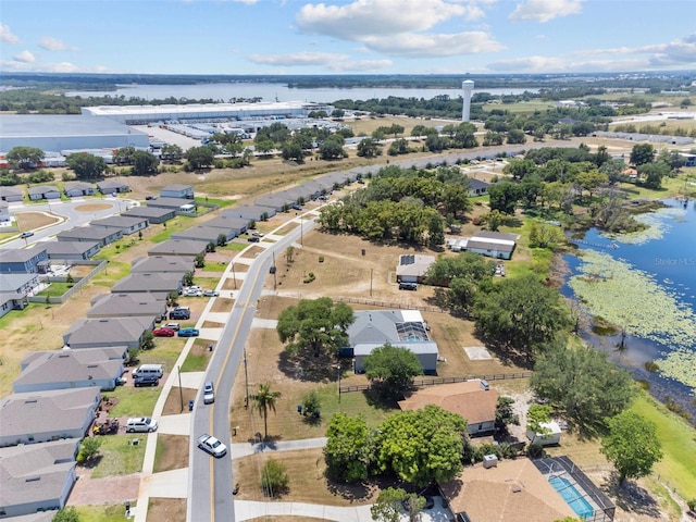 bird's eye view with a water view and a residential view