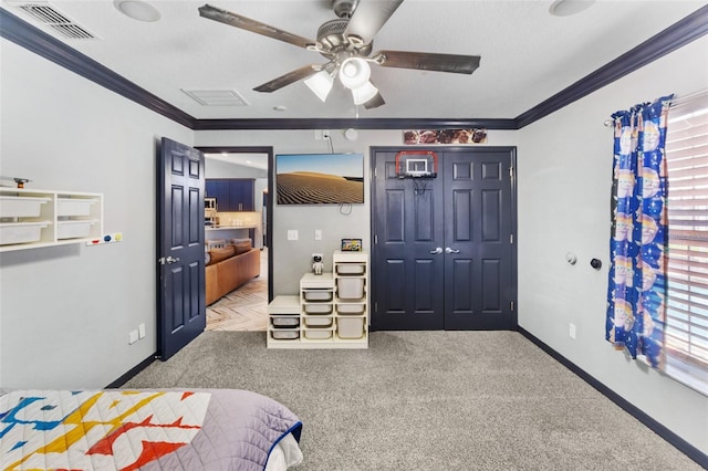 bedroom featuring ornamental molding, visible vents, carpet floors, and baseboards