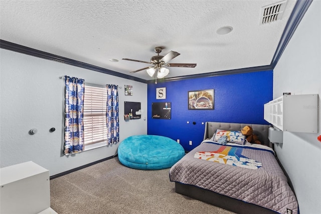 carpeted bedroom with a textured ceiling, a textured wall, visible vents, baseboards, and ornamental molding