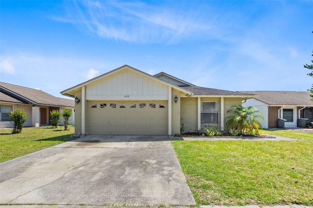 single story home with a garage and a front yard