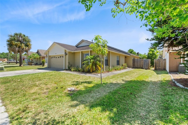 ranch-style house with a garage and a front yard