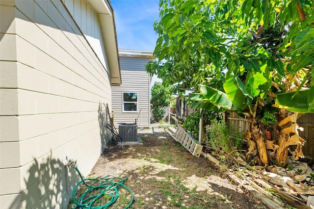 view of yard with central AC unit