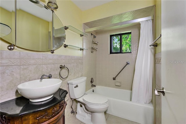 full bathroom featuring shower / bathtub combination with curtain, tile flooring, oversized vanity, tile walls, and toilet