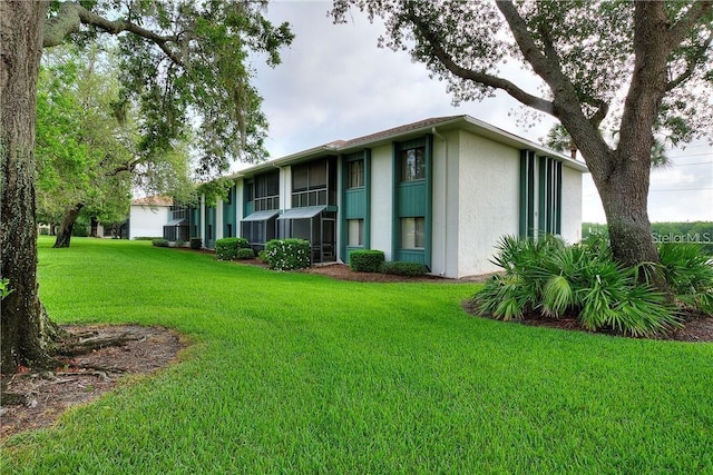 exterior space featuring a front yard