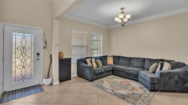 tiled living room featuring crown molding and a chandelier