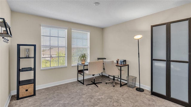 office space featuring light tile patterned floors