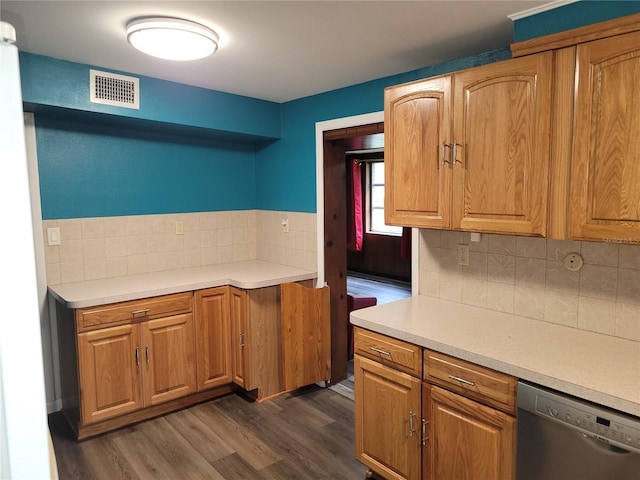 kitchen featuring backsplash, stainless steel dishwasher, and dark wood-type flooring