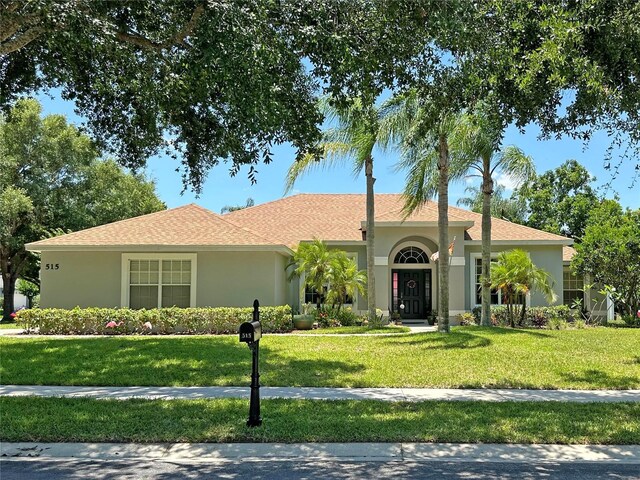 view of front of home featuring a front lawn