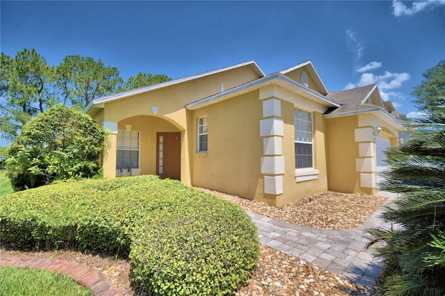 view of front of home featuring a garage