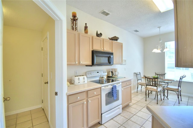 kitchen with electric stove, hanging light fixtures, light tile patterned floors, light brown cabinetry, and a notable chandelier