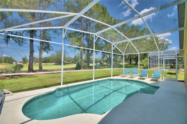 view of swimming pool with a lawn, glass enclosure, and a patio