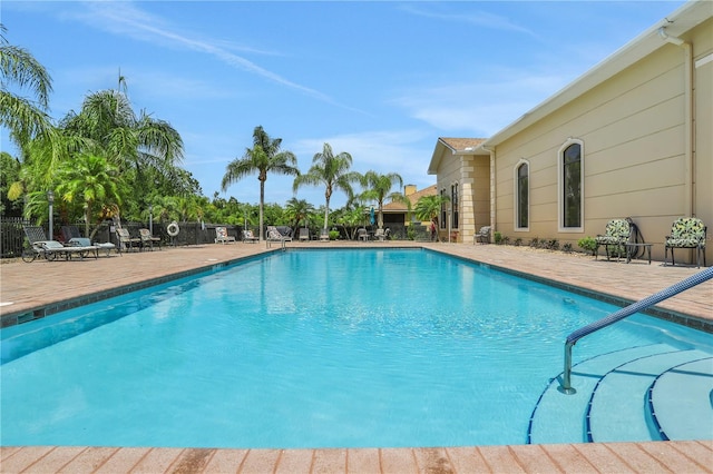 view of swimming pool featuring a patio