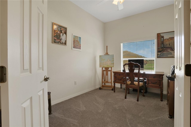 carpeted home office with ceiling fan