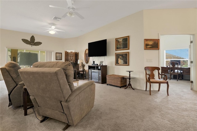 living room with light colored carpet and ceiling fan