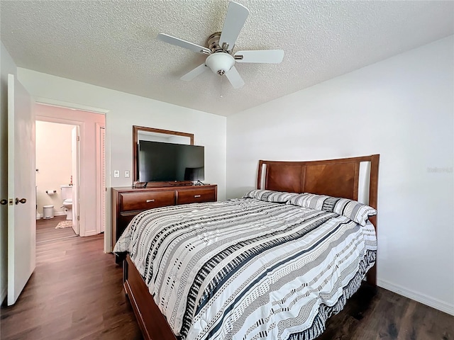 bedroom featuring ceiling fan, dark hardwood / wood-style flooring, and a textured ceiling