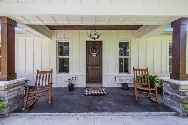 property entrance featuring covered porch