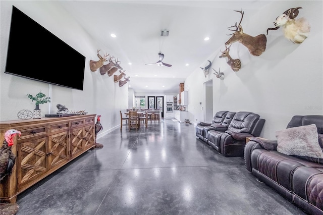 living room with ceiling fan