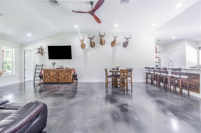 living room featuring sink, vaulted ceiling, and ceiling fan