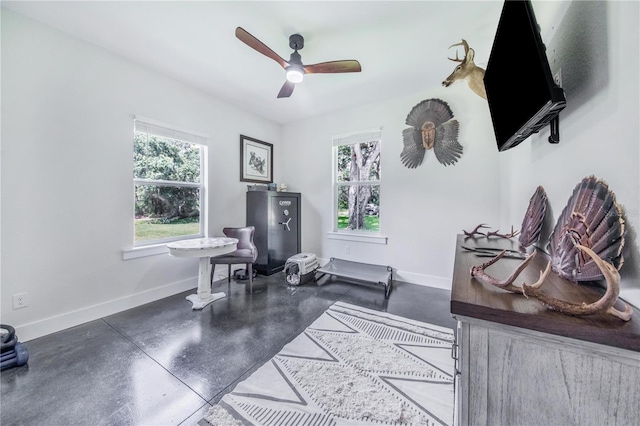 interior space featuring ceiling fan