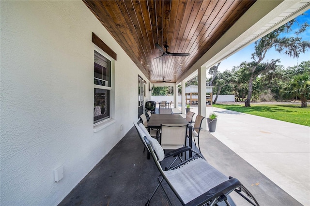 view of patio featuring ceiling fan