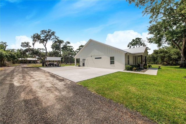 view of property exterior featuring a yard