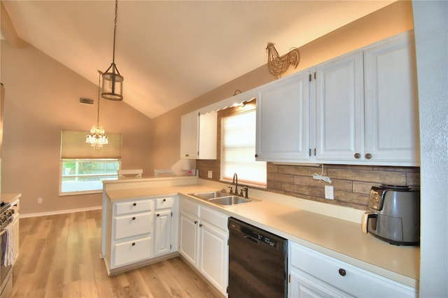 kitchen with black dishwasher, decorative light fixtures, light countertops, white cabinetry, and a peninsula