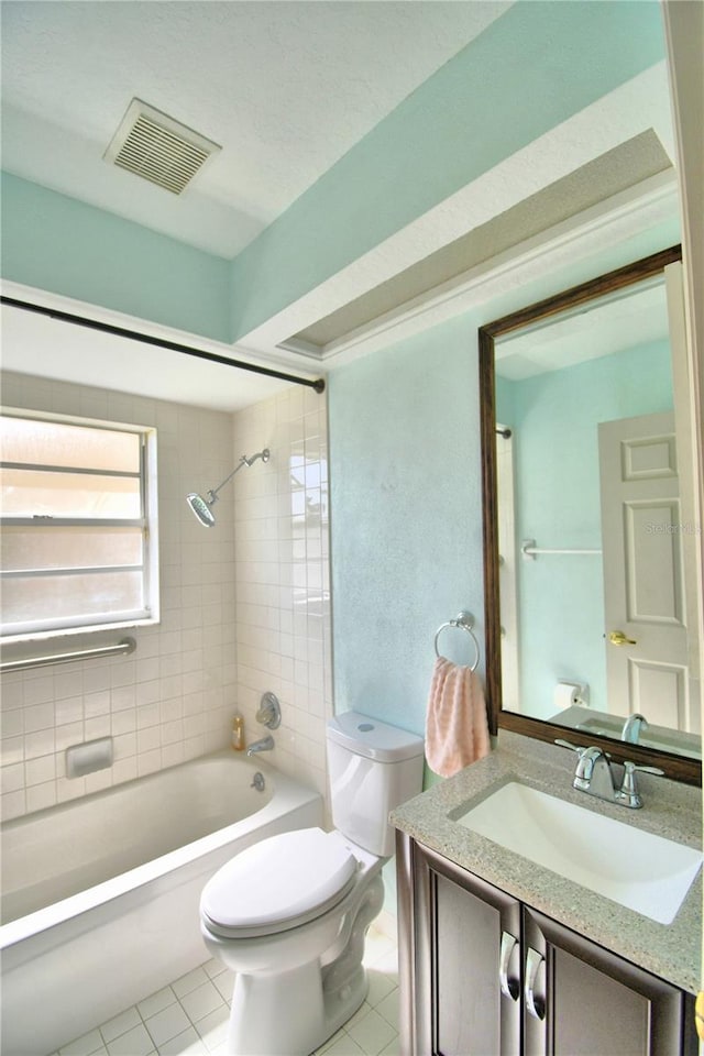 full bath with shower / washtub combination, visible vents, toilet, and tile patterned floors