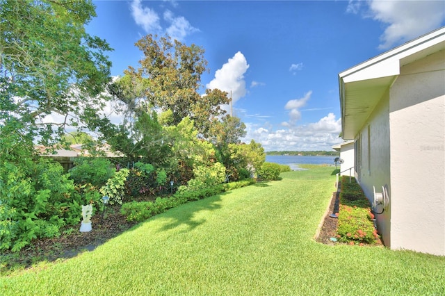 view of yard with a water view