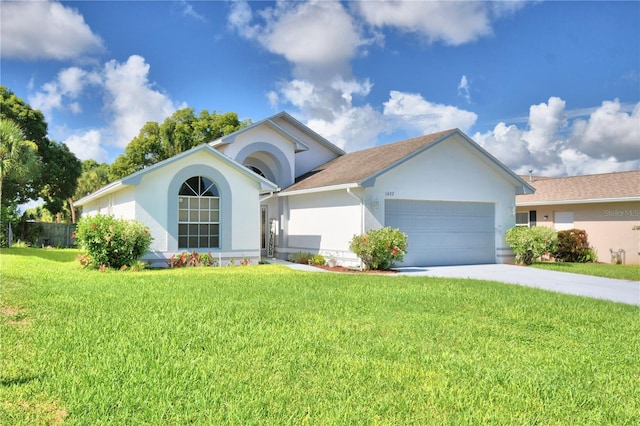 ranch-style house with a garage, a front lawn, concrete driveway, and stucco siding