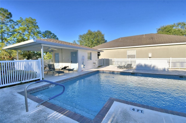 view of pool featuring ceiling fan, a patio, fence, and a fenced in pool