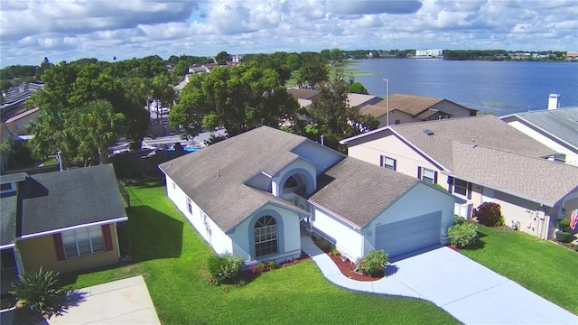 bird's eye view with a water view