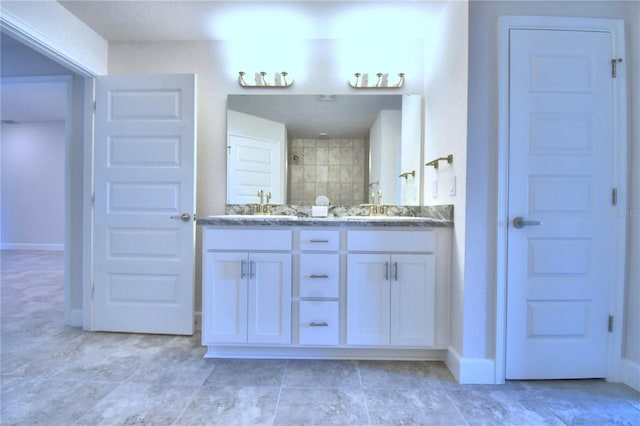 bathroom with vanity and walk in shower