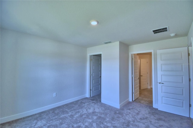 unfurnished bedroom featuring carpet flooring